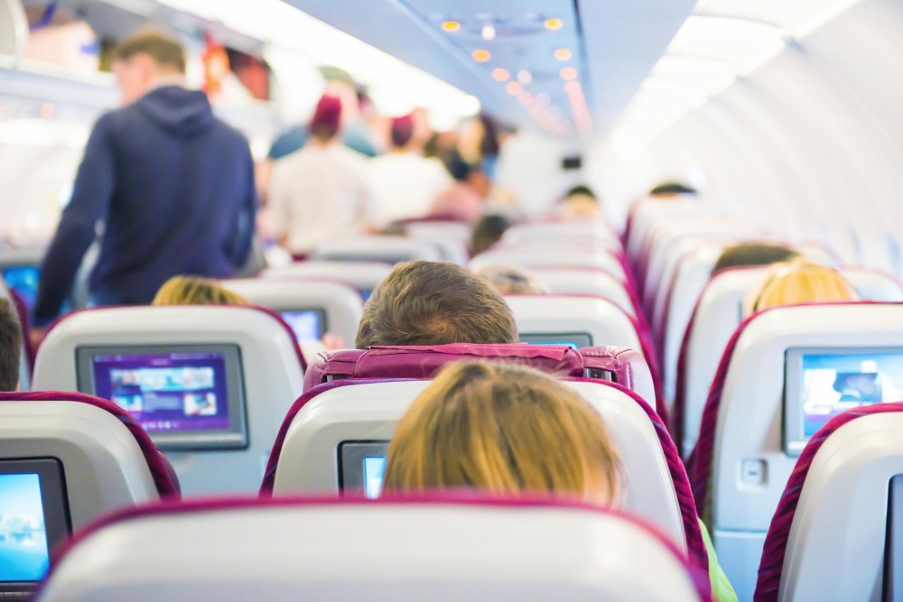 Photo de passagers dans un avion